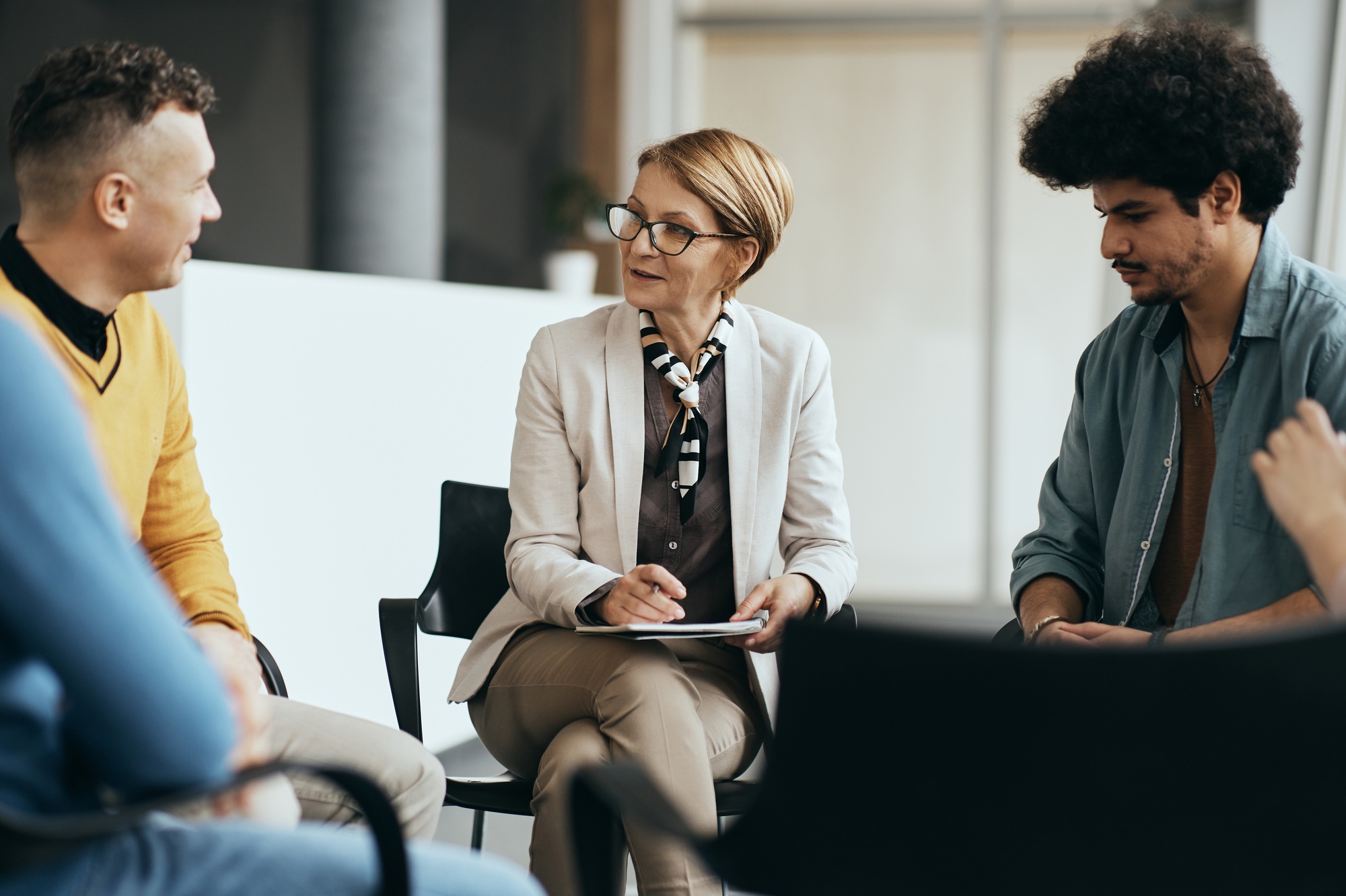 Happy support group session – showing the importance of NDIS Mental Health Support in building confidence and social connection
